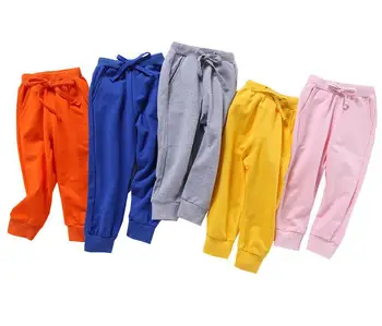 Wiosenne dla dzieci długie spodnie kolorowe spodnie dla chłopców, odzież Dziecięca moda czysta bawełna kieszenie sportowe Dziecięce legginsy nowa dostawa