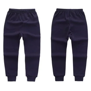 Nowe demi dziecięce spodnie jednolity kolor dla chłopców i dziewcząt strona ubrania miękkie bawełniane długie spodnie dla dzieci dzieci dzieci elastyczne legginsy
